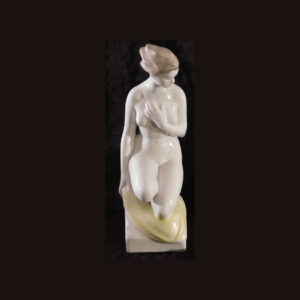 nude female statue facing foward